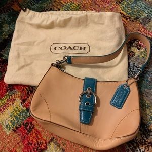 Coach leather mini bag with teal accents